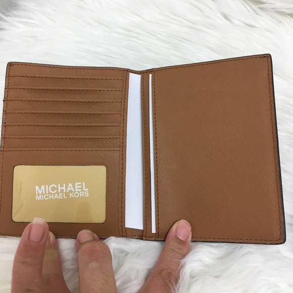 Michael Kors Handbags - New Michael Kors passport wallet